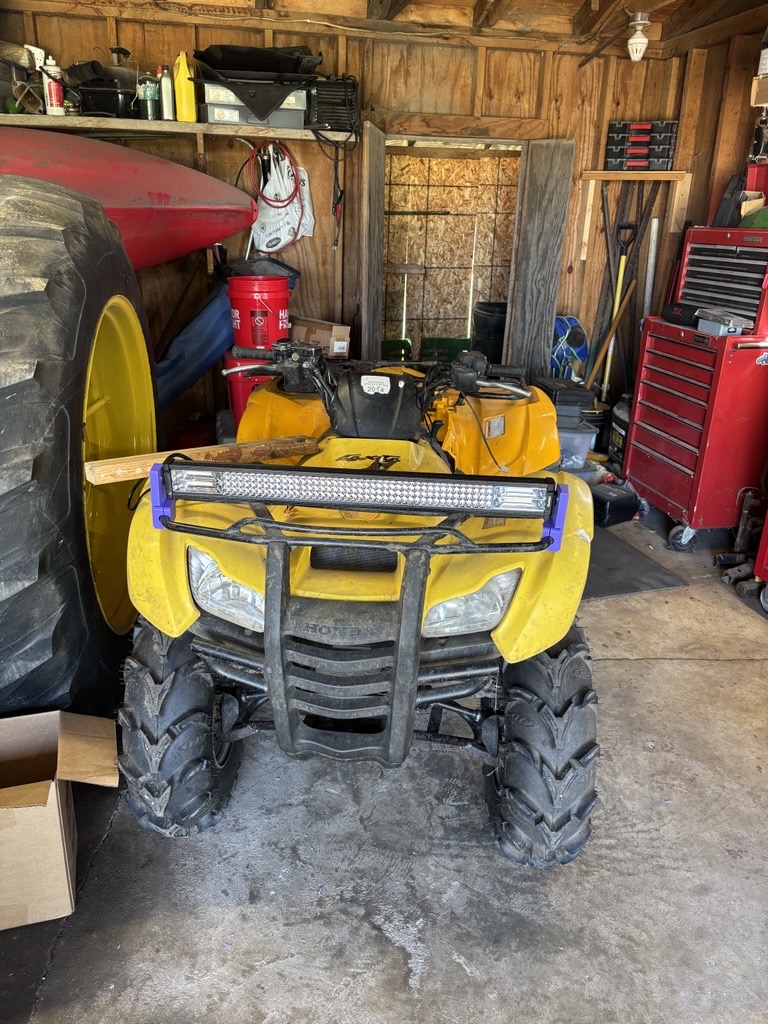 Front view of the four-wheeler with its light bar mounted