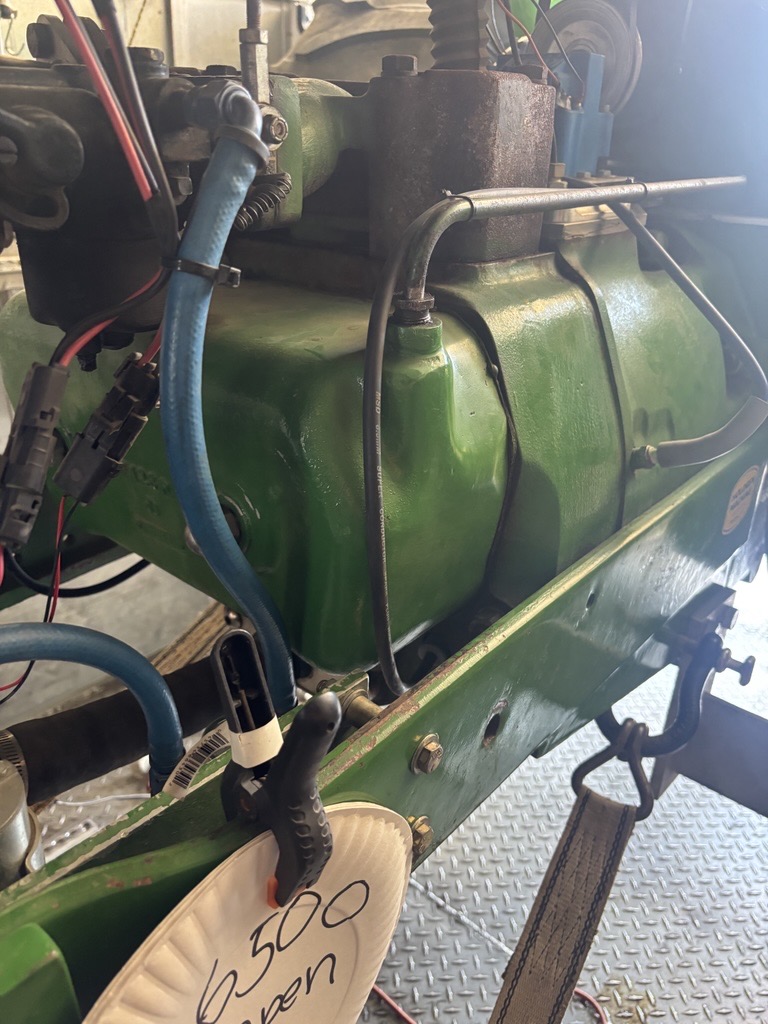 Original cast-iron valve cover on the engine